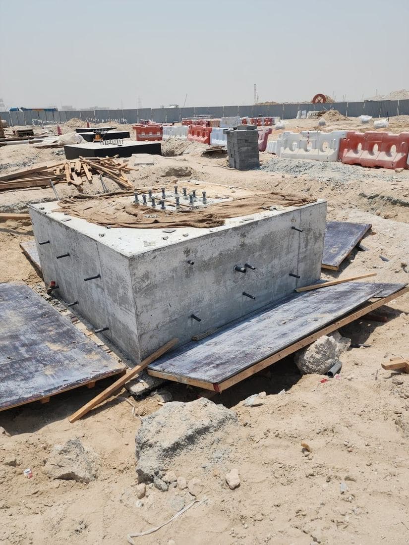 Completed in-situ RC chamber with starter bars and cast-in fixings, ready for backfill.
